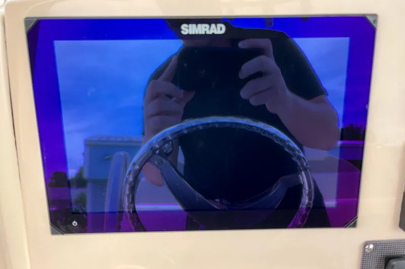 Slide: The Image of Simrad display on Boston Whaler 220 Dauntless 2026 boat. - 19