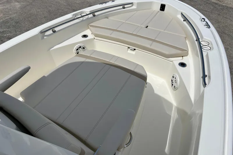 Slide: The Image of Interior of 2026 Boston Whaler 220 Dauntless with beige upholstery. - 20