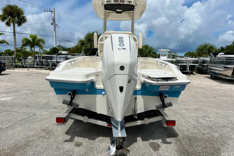 Slide: The Image of Boston Whaler 220 Dauntless 2026 with V8 engine, parked on a trailer. - 7