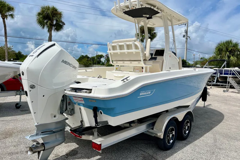 Slide: The Image of 2026 Boston Whaler 220 Dauntless boat with Mercury engine. - 8