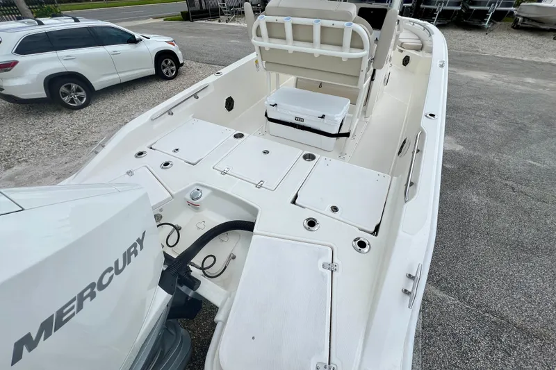 Slide: The Image of 2026 Boston Whaler 250 Dauntless with Mercury engine, spacious deck. - 10