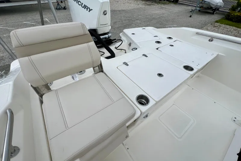 Slide: The Image of Interior of 2026 Boston Whaler 250 Dauntless with seating and storage. - 11
