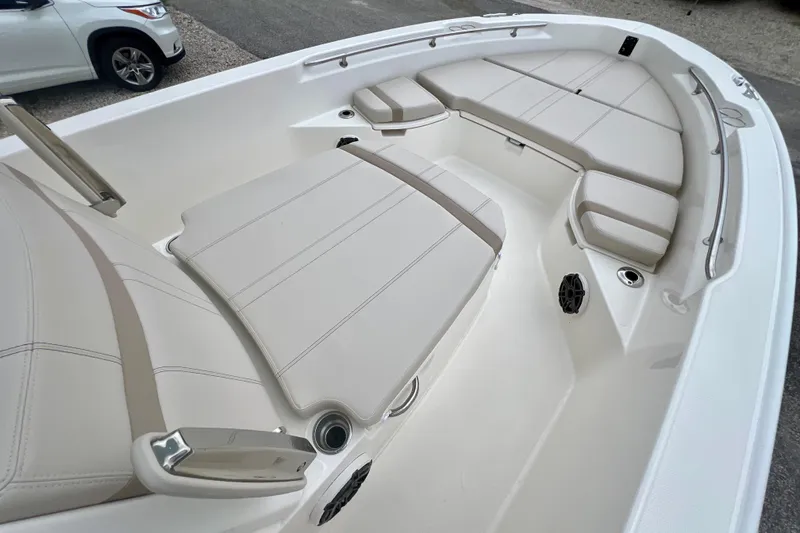 Slide: The Image of Interior of 2026 Boston Whaler 250 Dauntless with beige upholstery. - 23