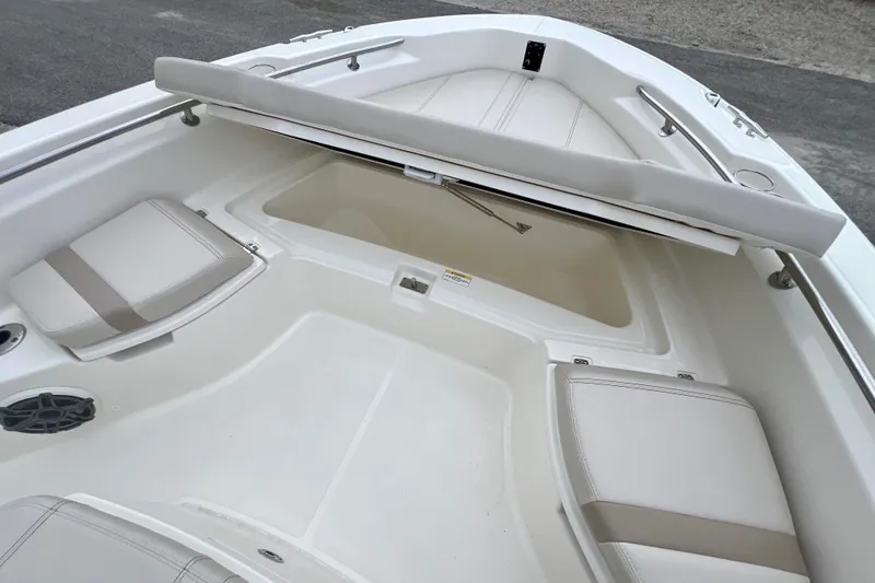 Slide: The Image of Interior of 2026 Boston Whaler 250 Dauntless with seating and storage. - 28