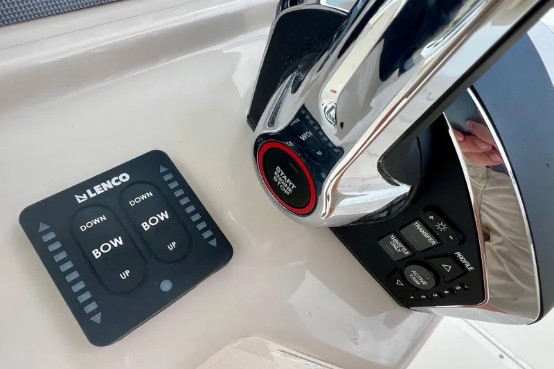Slide: The Image of Boston Whaler 250 Dauntless 2026 controls with Lenco panel. - 37