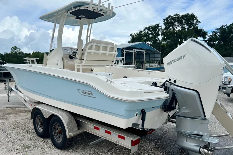 Slide: The Image of Boston Whaler 250 Dauntless 2026 on trailer with Mercury engine. - 6