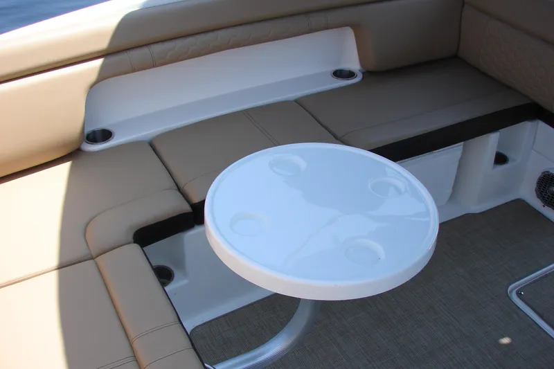 Slide: The Image of Interior view of 2018 Sea Ray SDX 290 boat bathroom with toilet and storage. - 27