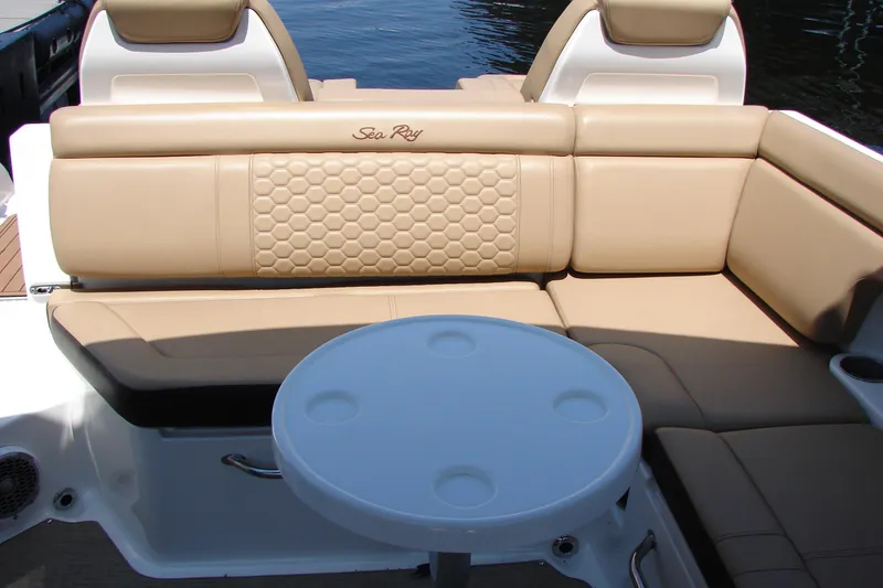 Slide: The Image of 2018 Sea Ray SDX 290 boat dashboard with cup holders and windshield. - 28