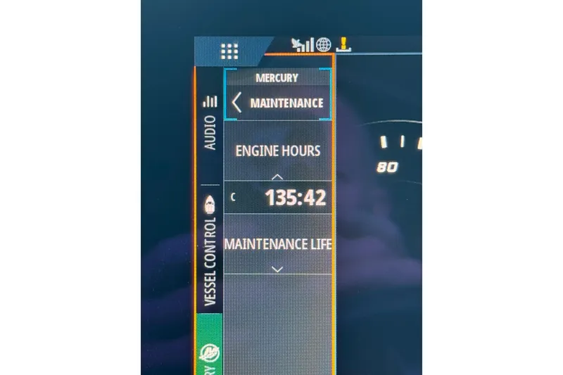 Slide: The Image of 2018 Sea Ray SDX 290 boat interior with beige seating and cup holders. - 31