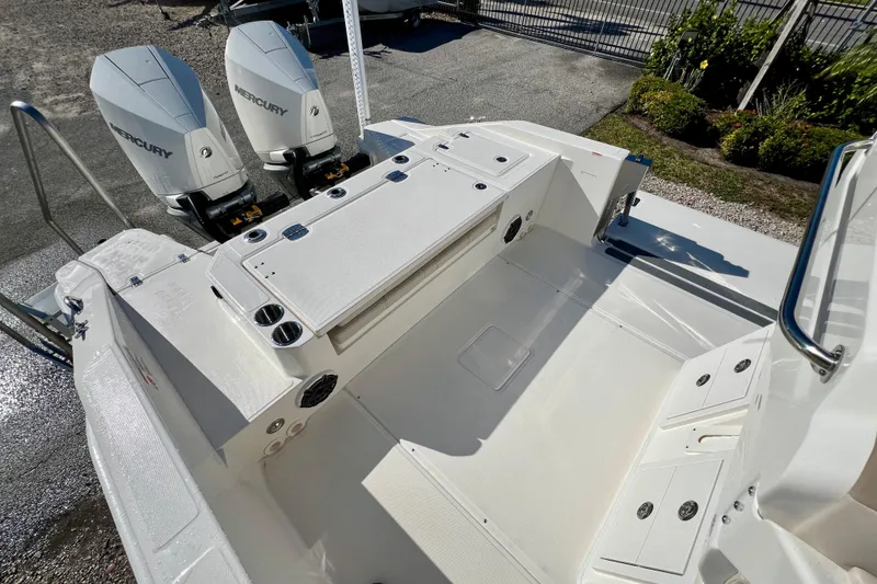 Slide: The Image of Boston Whaler 280 Dauntless 2026 with Mercury engines, spacious deck. - 10