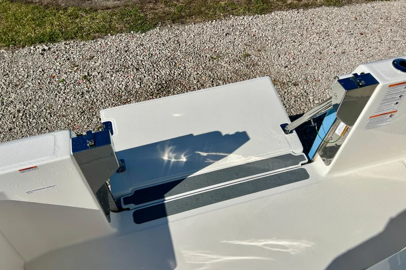 Slide: The Image of Boston Whaler 280 Dauntless 2026, boat deck with sun reflections. - 13