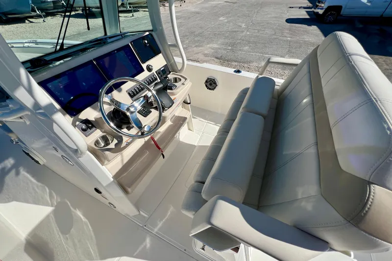 Slide: The Image of Interior view of 2026 Boston Whaler 280 Dauntless cockpit. - 19