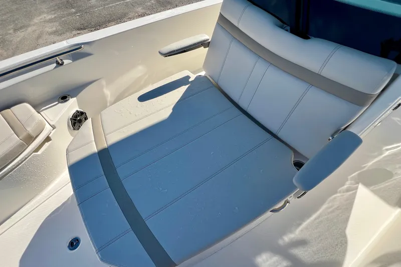 Slide: The Image of Seating area of 2026 Boston Whaler 280 Dauntless with cushioned seats. - 26