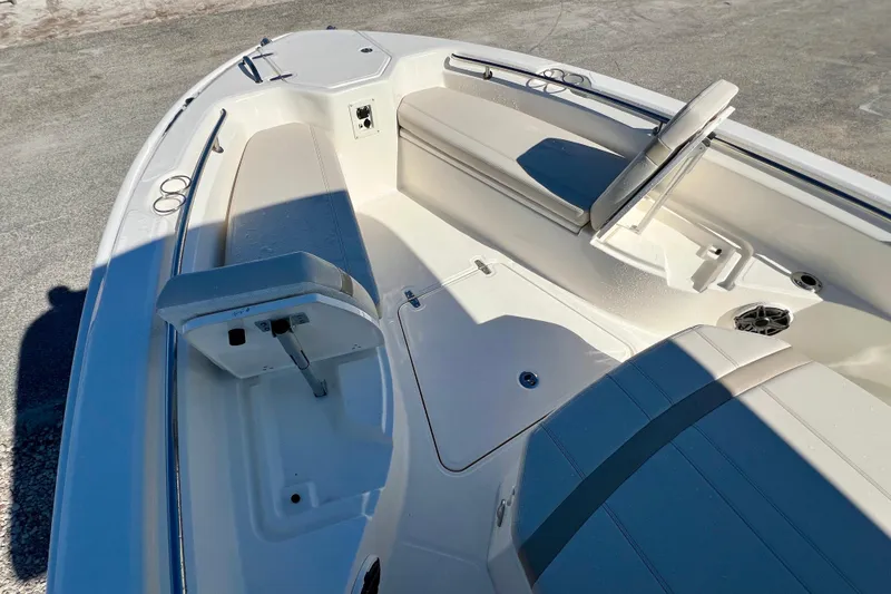 Slide: The Image of Interior of 2026 Boston Whaler 280 Dauntless with seating area. - 29