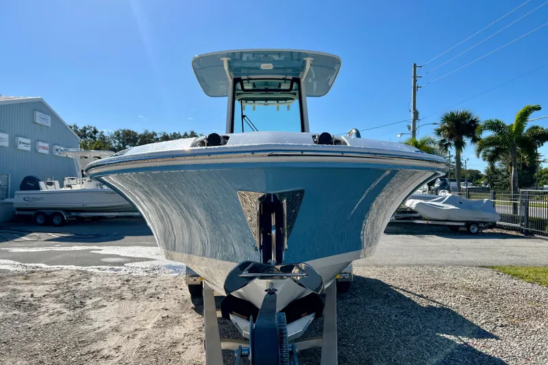 Slide: The Image of 2026 Boston Whaler 280 Dauntless boat on a trailer. - 3