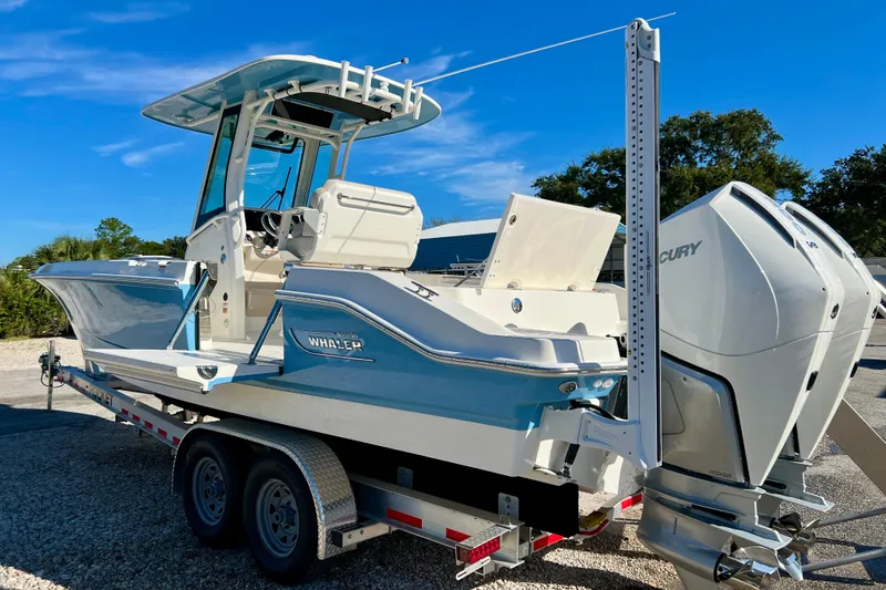 Slide: The Image of 2026 Boston Whaler 280 Dauntless on trailer, blue sky. - 6