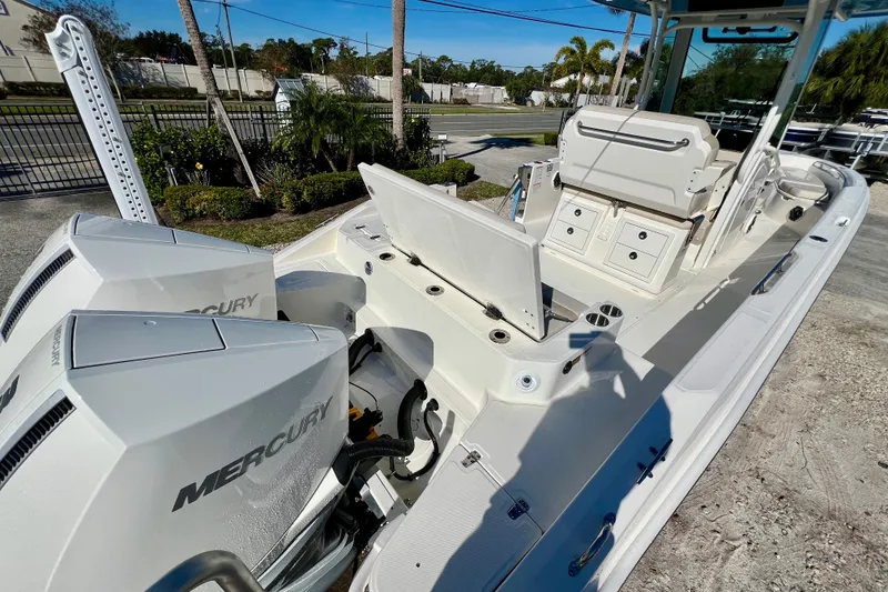 Slide: The Image of Boston Whaler 280 Dauntless 2026 with Mercury engines, spacious deck. - 8