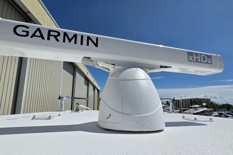 Slide: The Image of Garmin xHD2 radar on 2020 Invincible 35 Catamaran under clear blue sky. - 37