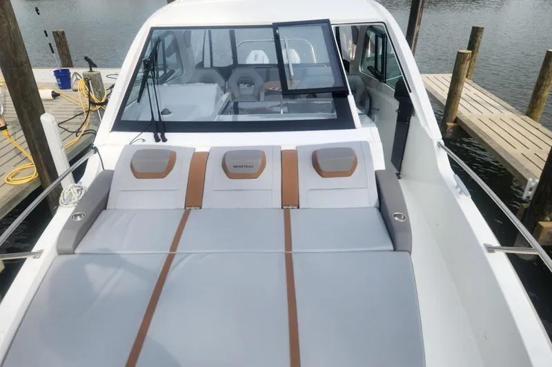 Slide: The Image of 2025 Beneteau Gran Turismo 32 yacht with sleek deck design and comfortable seating. - 18