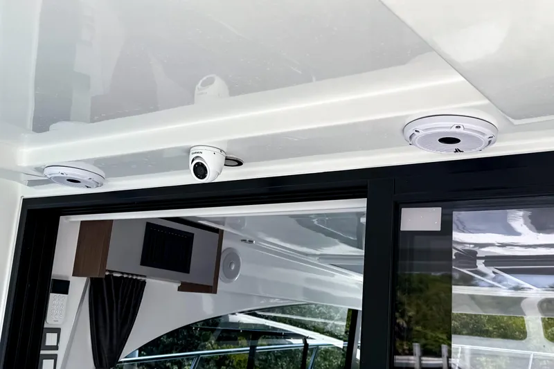 Slide: The Image of Security cameras and sensors on a 2023 Beneteau Antares 11 yacht ceiling. - 15