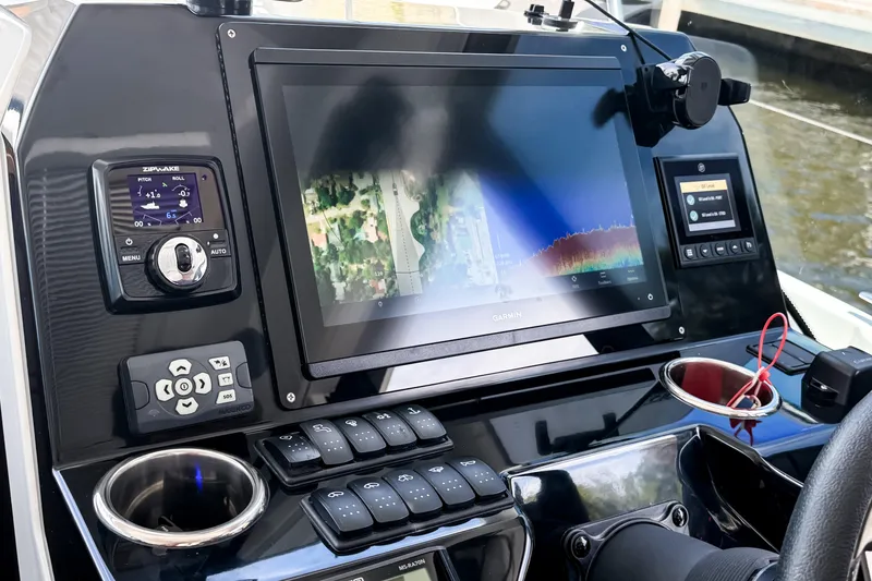 Slide: The Image of Dashboard of 2023 Beneteau Antares 11 with Garmin navigation system. - 27