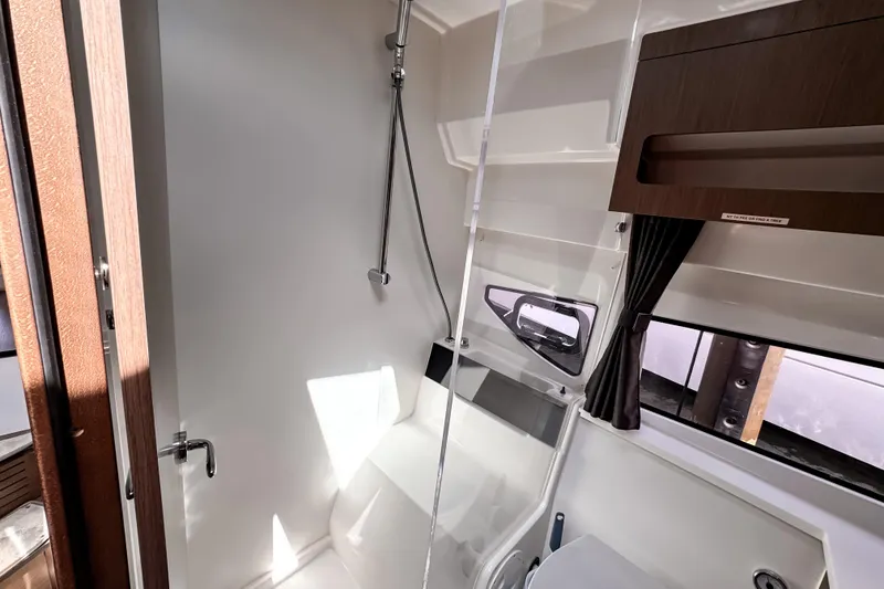 Slide: The Image of Modern bathroom interior of 2023 Beneteau Antares 11 yacht with shower and window. - 35