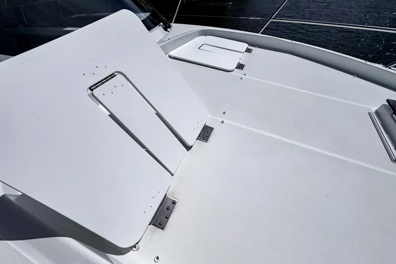 Slide: The Image of 2023 Beneteau Antares 11 deck with adjustable seating and ocean view. - 45