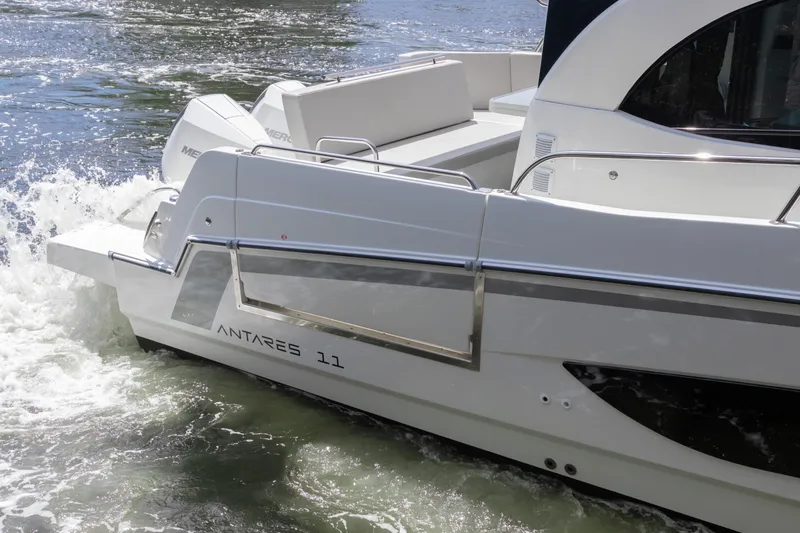 Slide: The Image of 2023 Beneteau Antares 11 boat cruising on water, showcasing sleek design and modern features. - 47