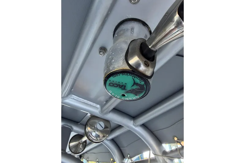 Slide: The Image of 2024 Strike 26 Center Console Cuddy boat interior with TACO Grand Slam outrigger handle. - 15