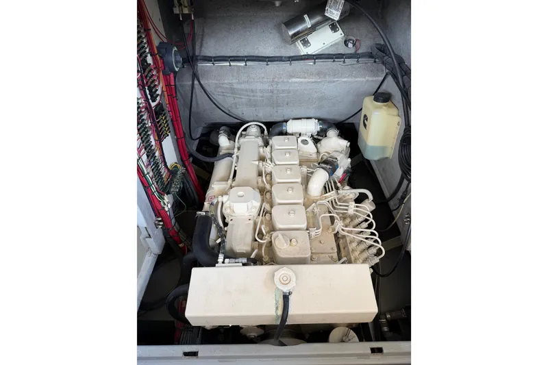 Slide: The Image of Engine compartment of 2024 Strike 26 Center Console Cuddy boat. - 4