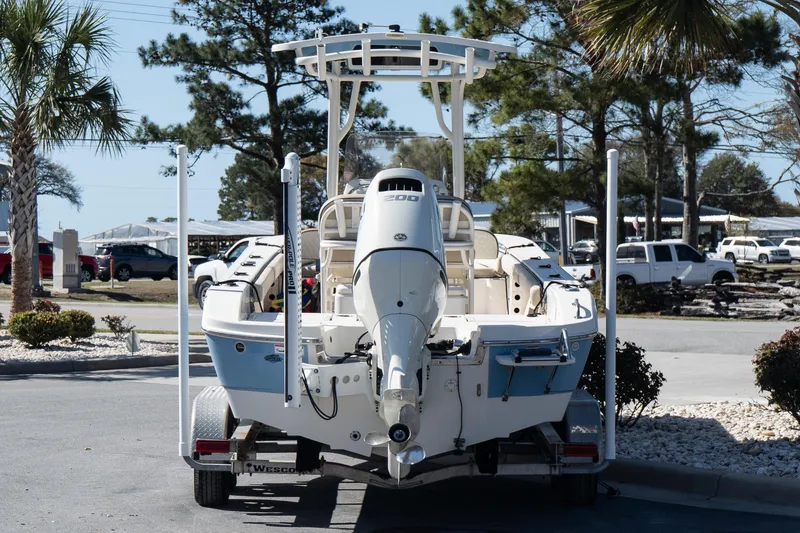 Slide: The Image of 2020 Carolina Skiff 24 Ultra Elite boat on trailer, parked outdoors. - 5