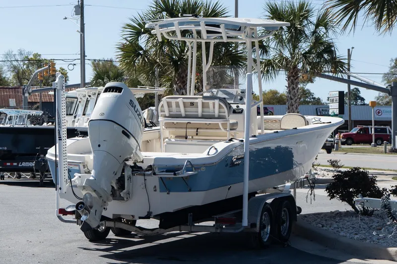 Slide: The Image of 2020 Carolina Skiff 24 Ultra Elite boat on trailer, parked outdoors. - 6