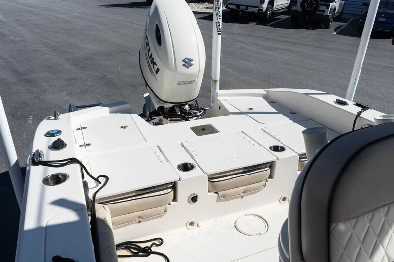 Slide: The Image of 2020 Carolina Skiff 24 Ultra Elite boat with Suzuki 200 engine, rear deck view. - 8