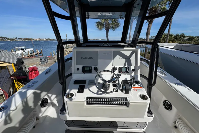 Slide: The Image of 2021 Invincible 36 Open Fisherman boat cockpit with Garmin navigation system. - 13