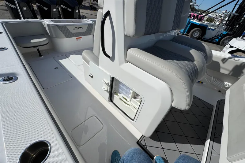 Slide: The Image of 2021 Invincible 36 Open Fisherman boat interior with seating and storage compartments. - 19