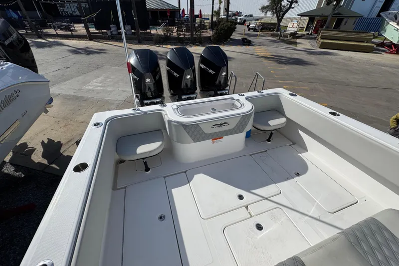 Slide: The Image of 2021 Invincible 36 Open Fisherman boat with triple Mercury engines at dock. - 20