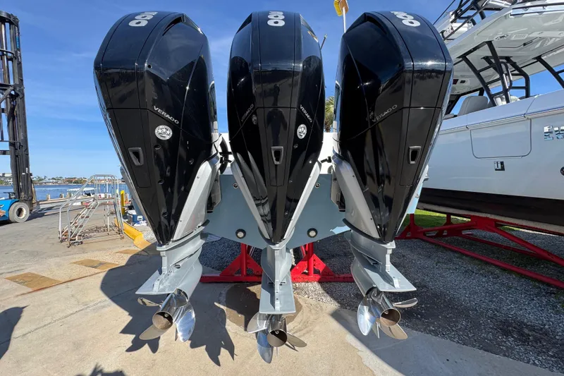 Slide: The Image of Triple outboard engines on a 2021 Invincible 36 Open Fisherman boat. - 22
