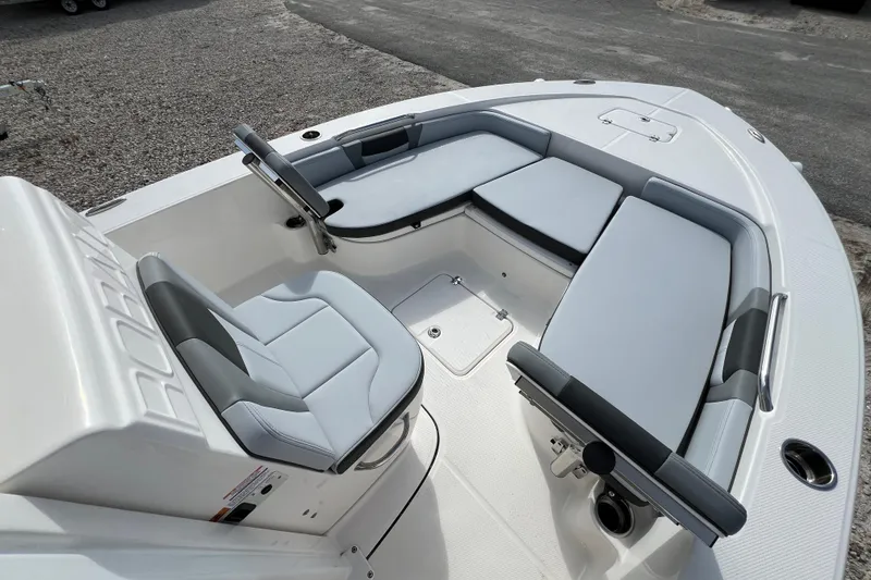 Slide: The Image of 2026 Robalo 226 Cayman boat interior with sleek seating and modern design. - 19