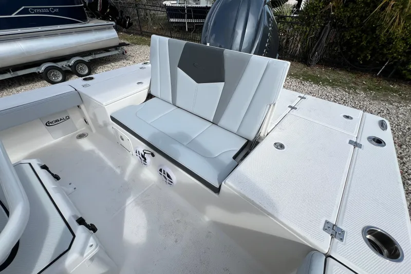 Slide: The Image of 2026 Robalo 226 Cayman boat interior with sleek seating and modern design. - 9