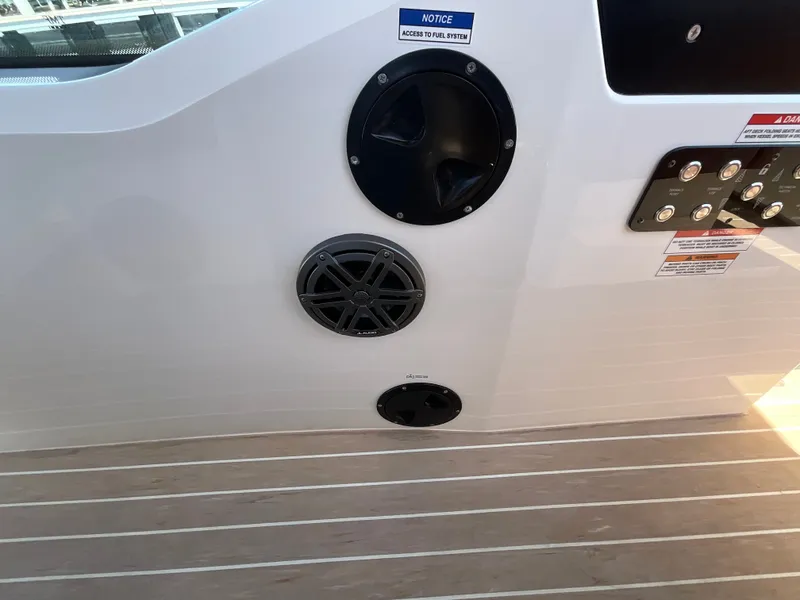 Slide: The Image of The image shows the deck of a Saxdor 320 GTO with speakers and control panels. - 25