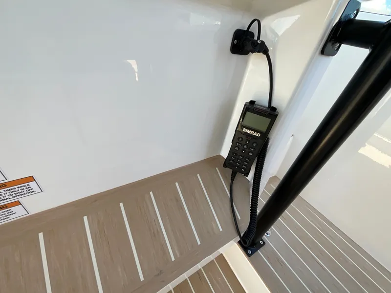 Slide: The Image of A radio is mounted on the wall of a boat. - 26
