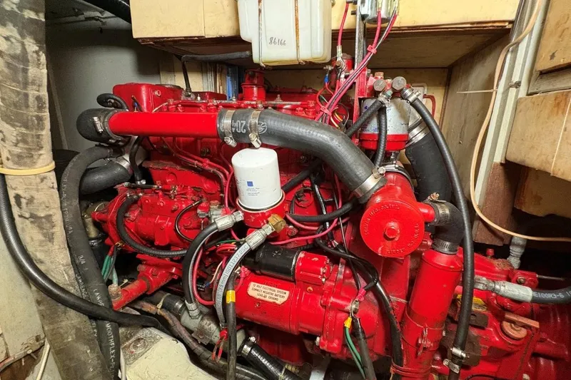 Slide: The Image of Red Norseman 447 engine from 1981 with visible hoses and wiring. - 39