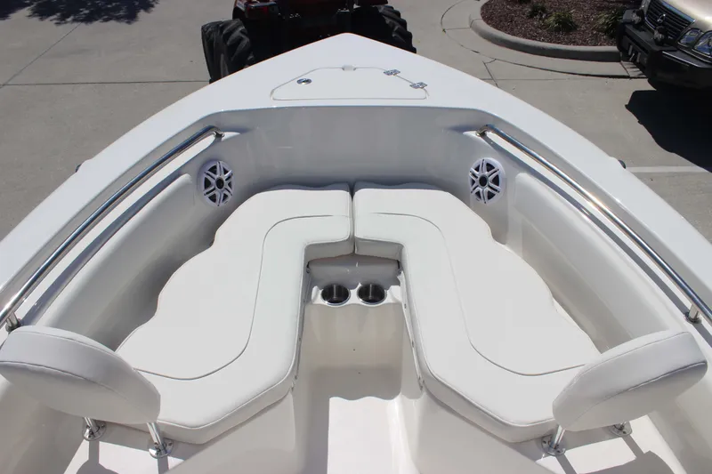 Slide: The Image of 2026 Key West 203 FS boat interior with white cushioned seating and stainless steel railings. - 15