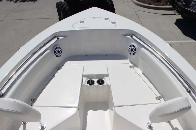 Slide: The Image of 2026 Key West 203 FS boat interior with seating and cup holders. - 17