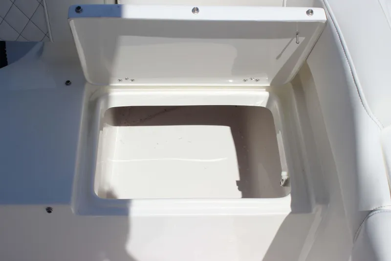 Slide: The Image of Open storage compartment on 2026 Key West 203 FS boat. - 26