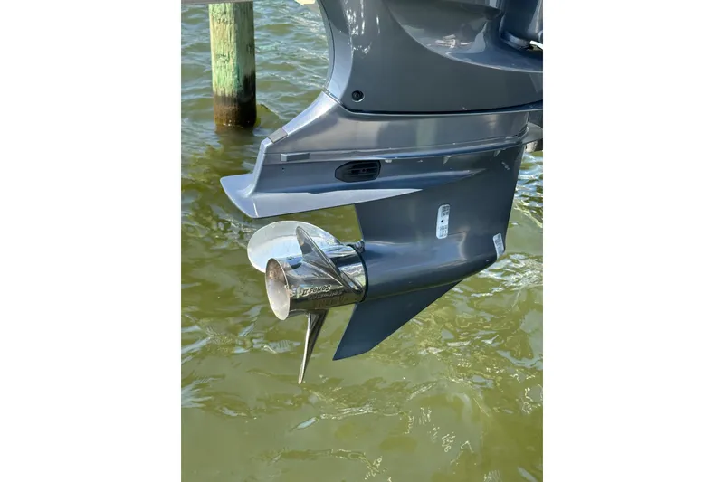 Slide: The Image of Close-up of 2022 Four Winns HD8 OB outboard motor propeller in water. - 26