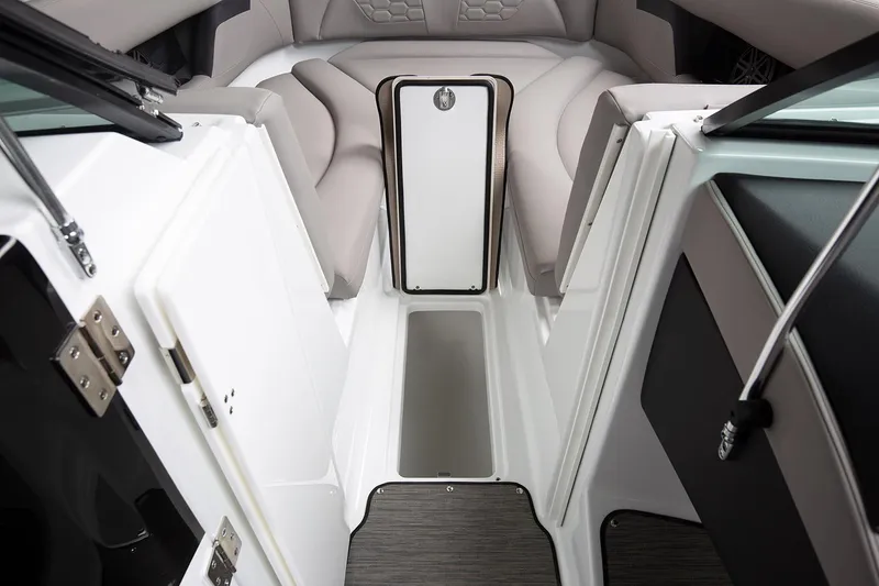 Slide: The Image of Manufacturer Provided Image: 2022 Four Winns HD8 OB boat interior with storage compartment and seating area. - 28