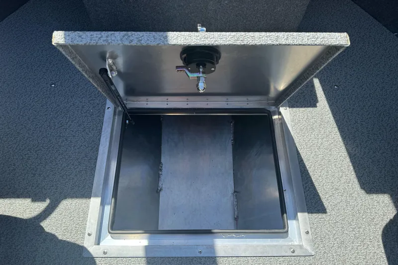 Slide: The Image of Open storage compartment in 2026 Lund 210 Heavy Gauge boat. - 17
