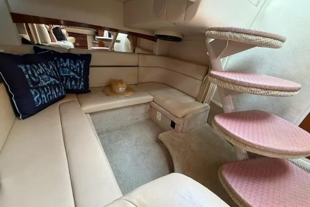Slide: The Image of Luxurious interior of 2006 Sea Ray Sundancer 320 yacht with plush seating and stylish decor. - 12