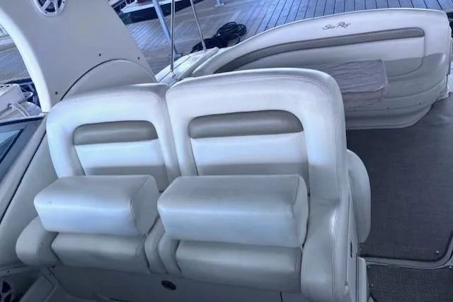 Slide: The Image of 2006 Sea Ray Sundancer 320 interior with white leather seating and elegant design. - 15